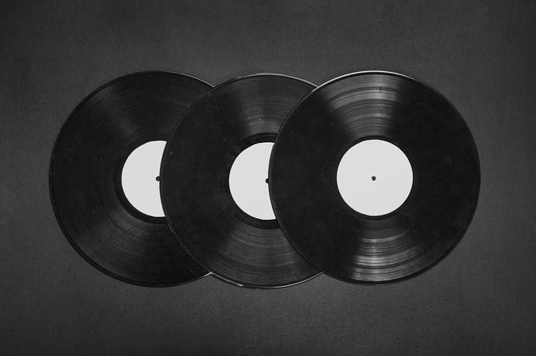 three vinyl records